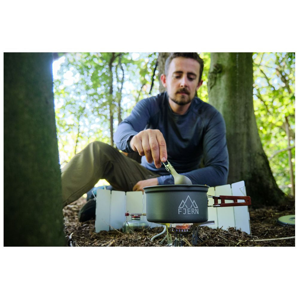 Fjern - Fjork Titanium Forked Spoon (Silver) | Discover the ultimate outdoor dining companion – our lightweight titanium foldable Fjork, a handy forked spoon that easily fits in your pocket or camping mug for meals on the go