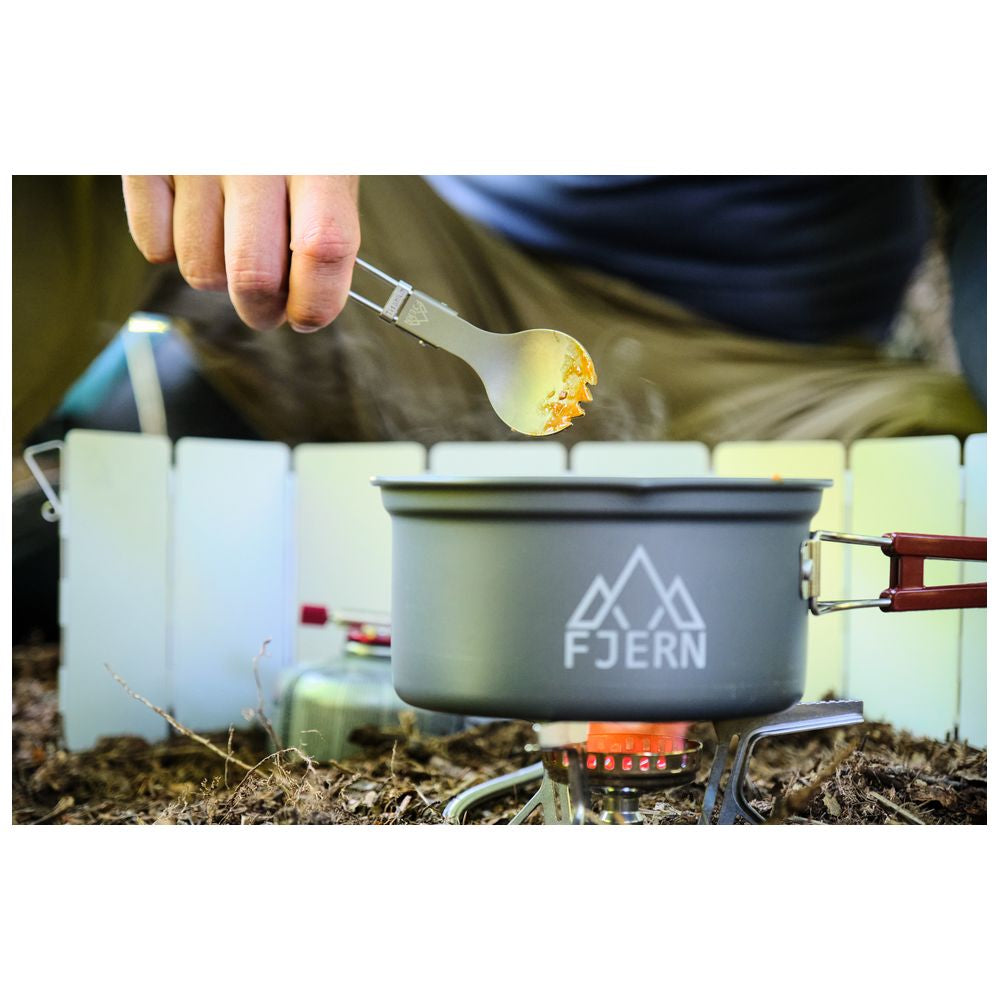 Fjern - Fjork Titanium Forked Spoon (Silver) | Discover the ultimate outdoor dining companion – our lightweight titanium foldable Fjork, a handy forked spoon that easily fits in your pocket or camping mug for meals on the go