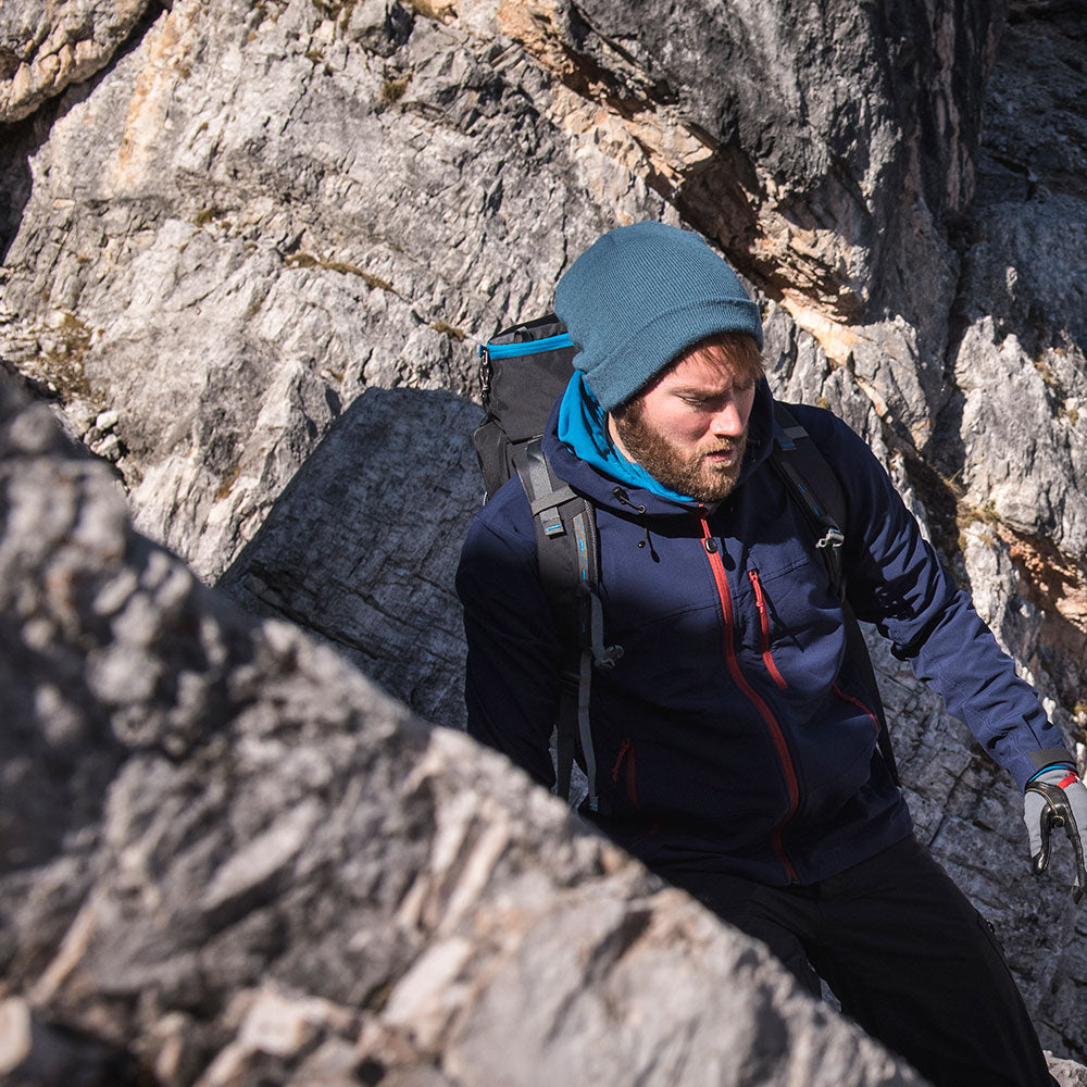 Rust) | Conquer the mountains with the Grenser softshell, the ultimate jacket for alpine adventures
