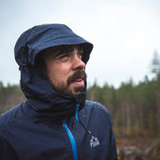 Fjern - Mens Skjold Packable Waterproof Jacket (Navy/Cobalt) | The Skjold is your ultimate shield for fast and light activities, designed to keep you active in any weather