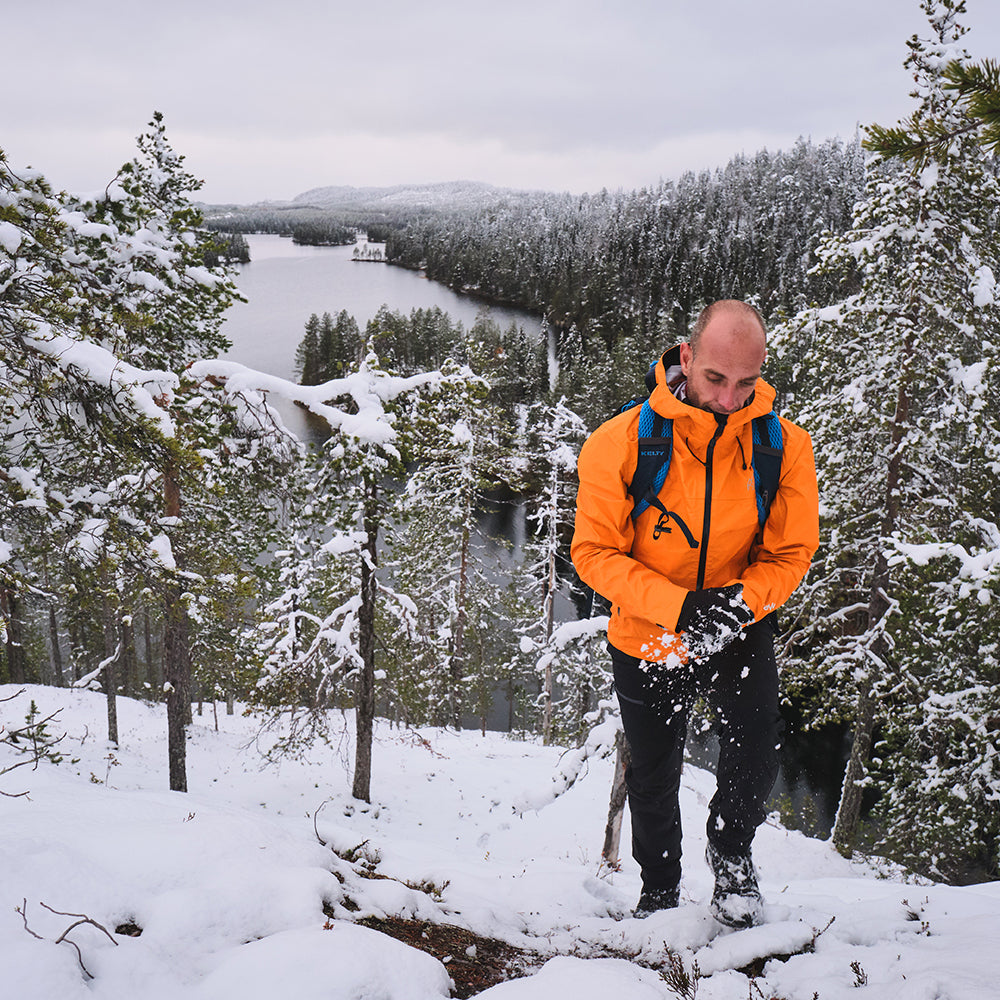 Fjern - Mens Skjold Packable Waterproof Jacket (Sunshine/Navy) | The Skjold is your ultimate shield for fast and light activities, designed to keep you active in any weather