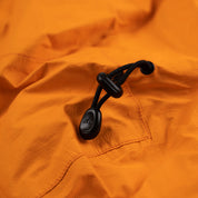 Fjern - Mens Skjold Packable Waterproof Jacket (Sunshine/Navy) | The Skjold is your ultimate shield for fast and light activities, designed to keep you active in any weather