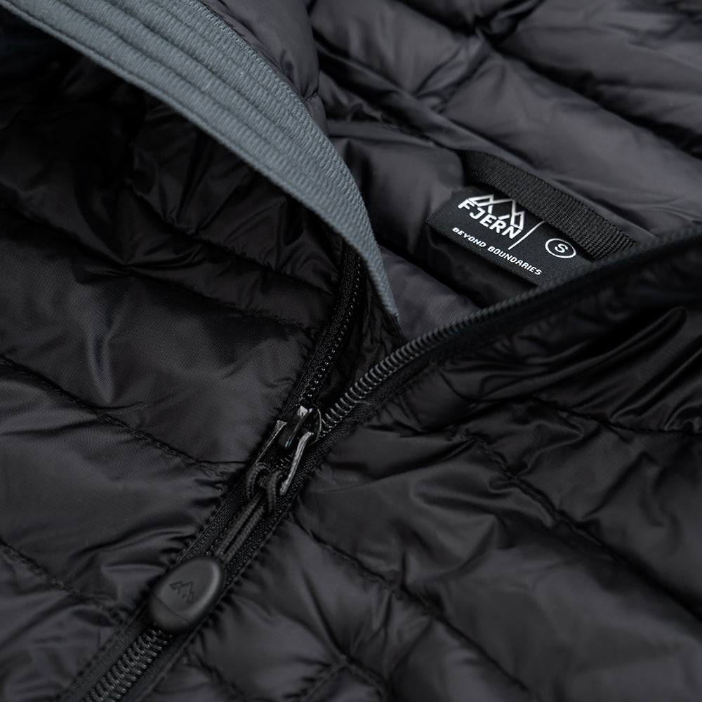 Fjern - Womens Aktiv Down Hooded Jacket (Stealth) | Venture further with the Aktiv, a versatile and lightweight insulated layer that offers exceptional warmth in a compact package