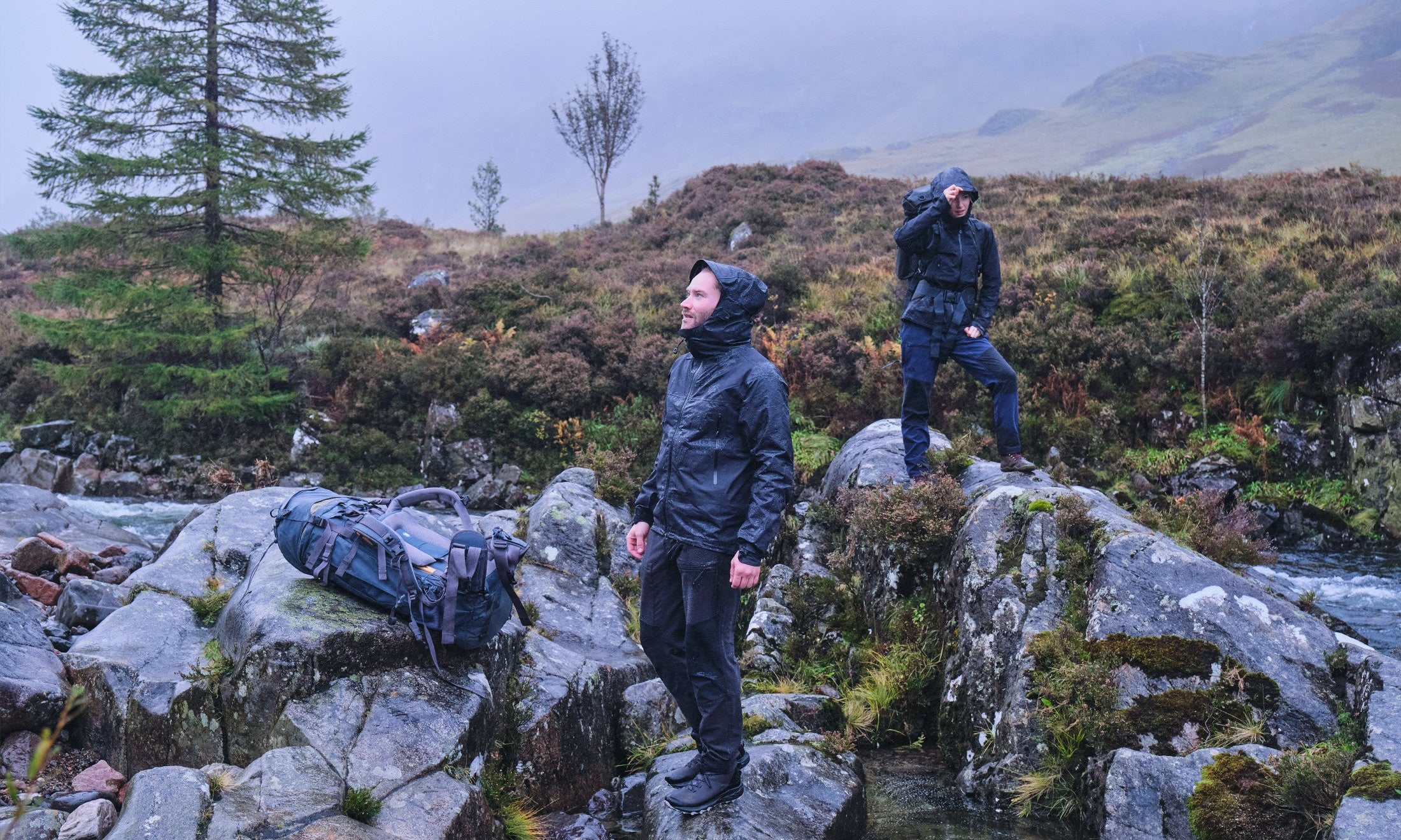 Fjern Orkan Jackets in &#39;Stealth&#39; colourway on a rainy Highland moor
