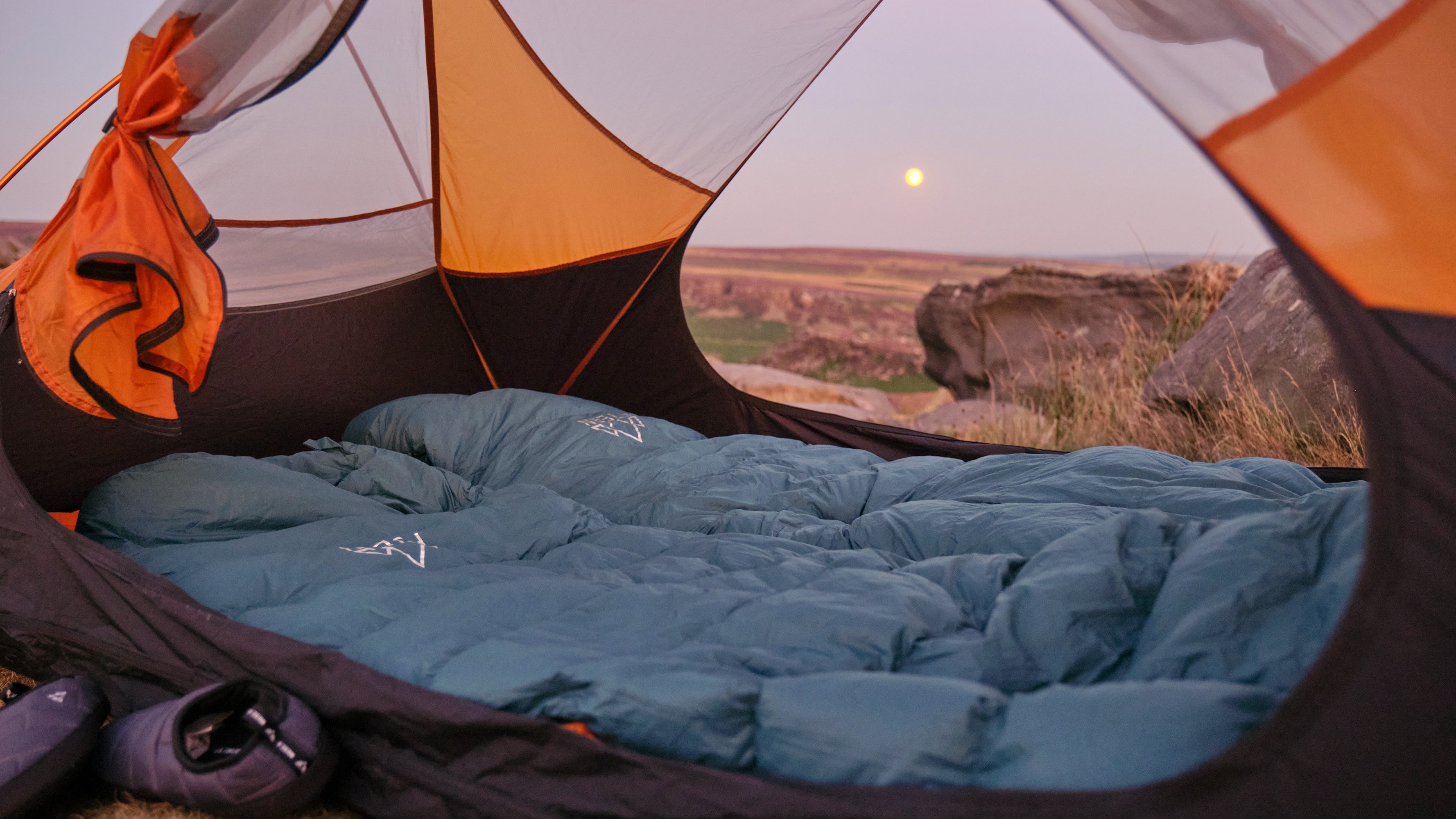 View of a striking sunset from within a tent