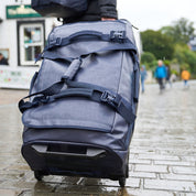 Fjern - Orädda 105L Wheeled Bag (Midnight) | The Orädda 105L Roller Duffle Bag is a rugged travel companion designed for durability