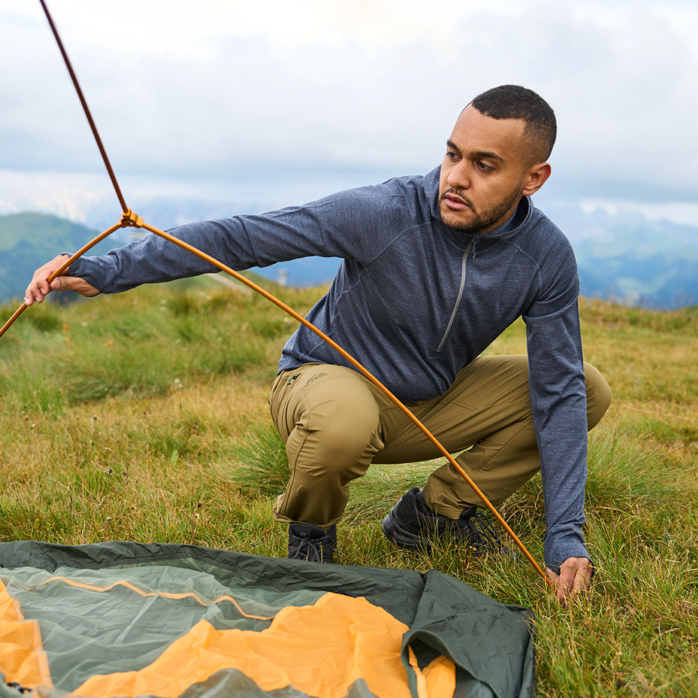 Fjern - Mens Första Merino Blend Long Sleeve Hoodie Baselayer (Storm Grey) | Embark on your next adventure with the Första Hoodie, a lightweight and high-performance technical hoodie