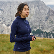 Fjern - Womens Första Merino Blend Long Sleeve Hoodie Baselayer (Navy) | Embark on your next adventure with the Första Hoodie, a lightweight and high-performance technical hoodie