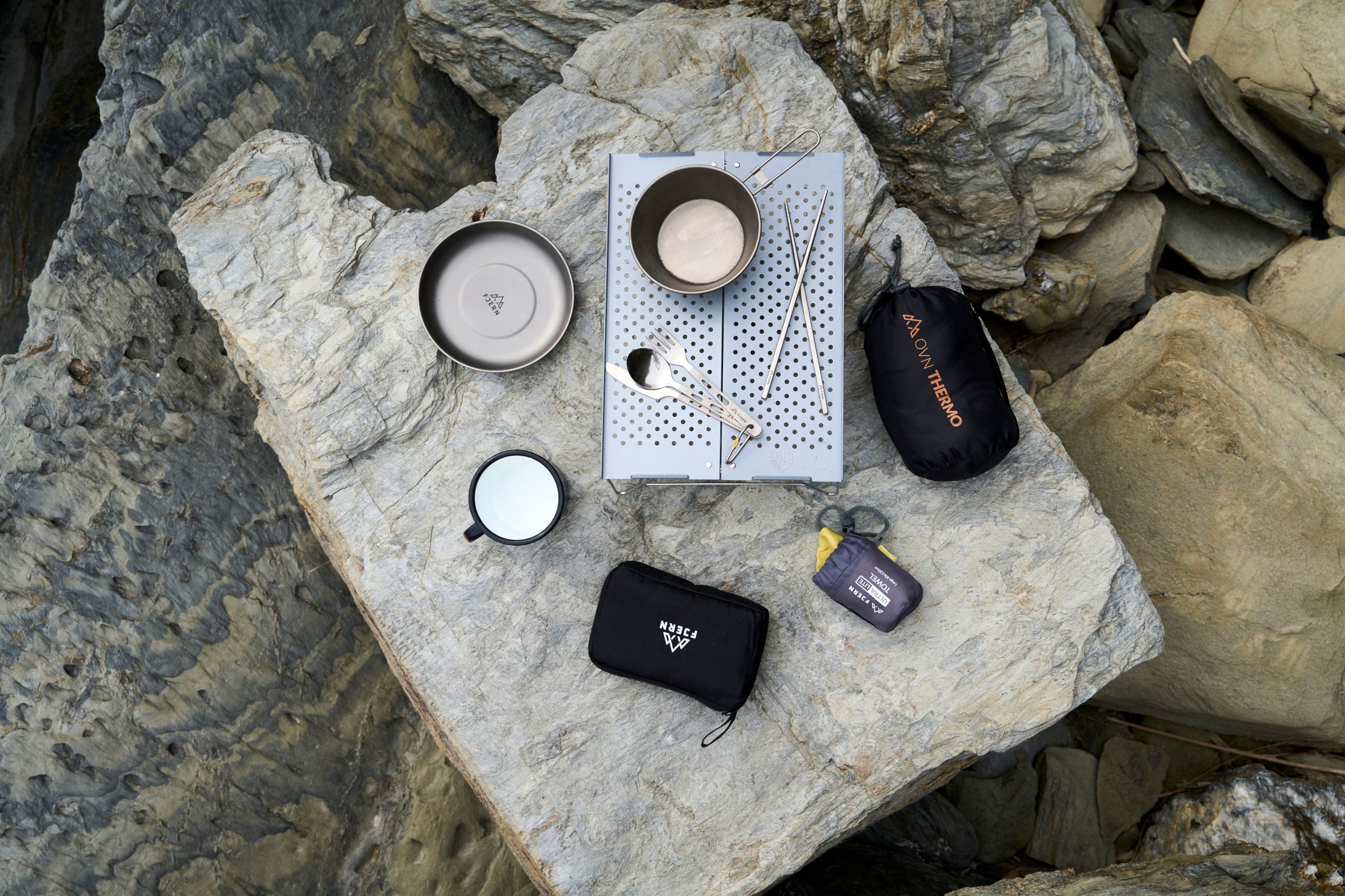Camping gear on a rock surface