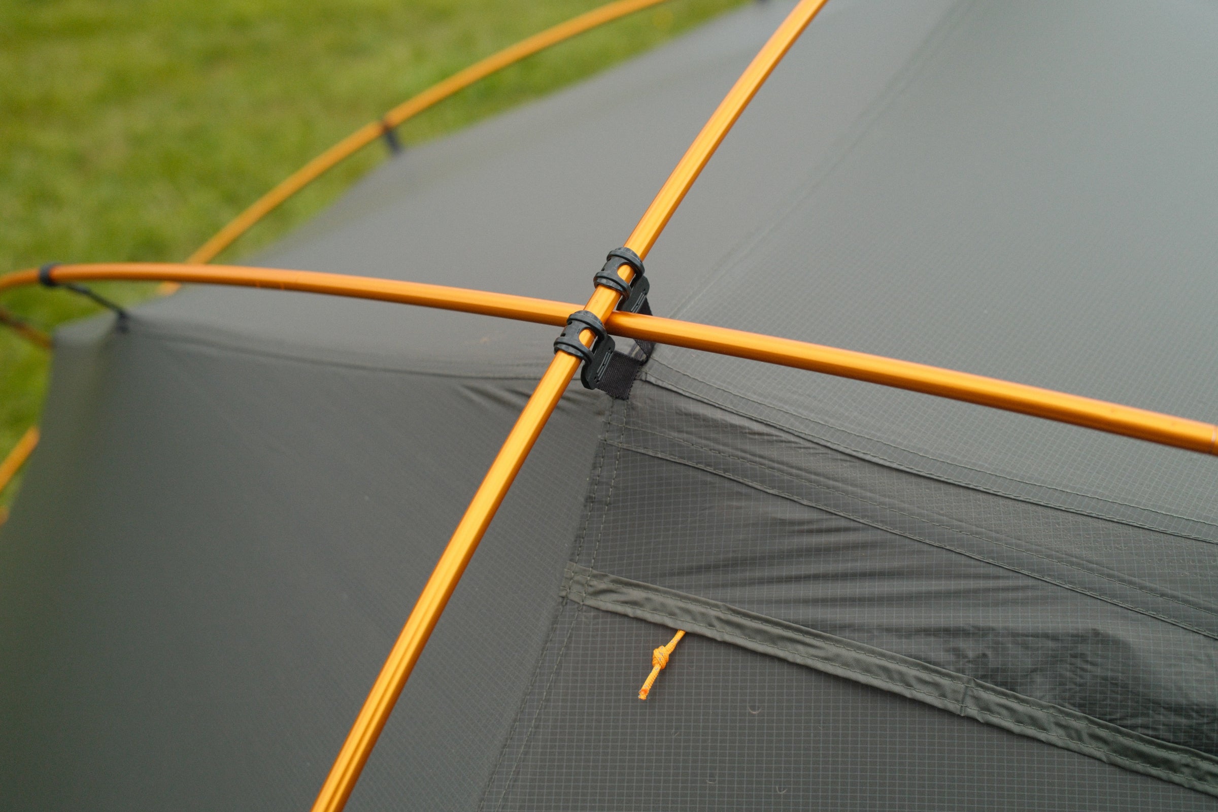 Close-up of the Stormgrotta's updated pole clip system