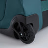 Fjern - Orädda 105L Wheeled Bag (Petrol) | The Orädda 105L Roller Duffle Bag is a rugged travel companion designed for durability