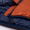Fjern - Mens Aktiv Down Gilet (Burnt Orange/Navy) | Gear up your alpine performance with the Aktiv Gilet, a versatile and lightweight insulated layer that offers core warmth without the bulk