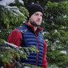Fjern - Mens Aktiv Down Gilet (Navy/Rust) | Gear up your alpine performance with the Aktiv Gilet, a versatile and lightweight insulated layer that offers core warmth without the bulk