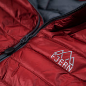 Fjern - Mens Aktiv Down Gilet (Rust/Charcoal) | Gear up your alpine performance with the Aktiv Gilet, a versatile and lightweight insulated layer that offers core warmth without the bulk