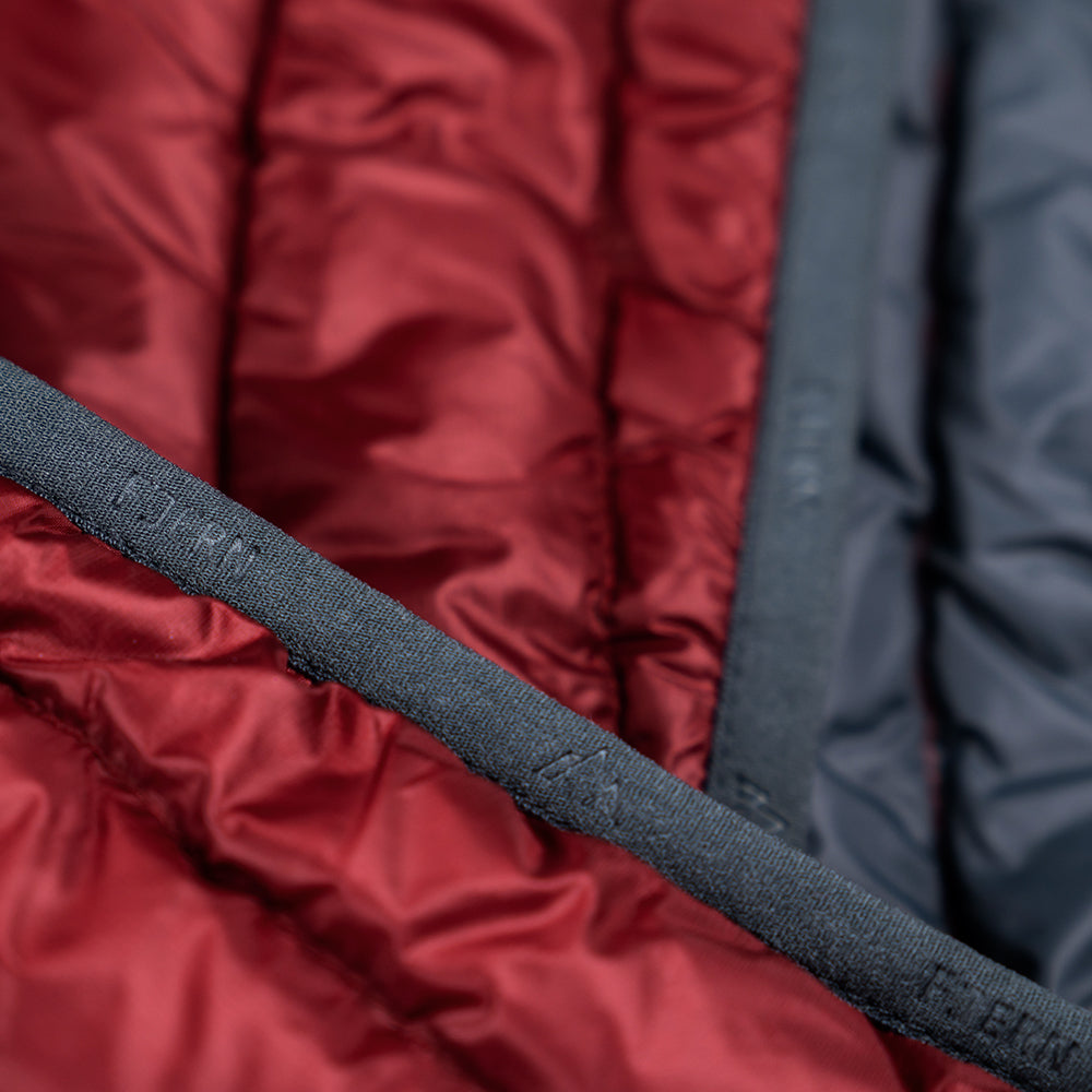 Fjern - Mens Aktiv Down Gilet (Rust/Charcoal) | Gear up your alpine performance with the Aktiv Gilet, a versatile and lightweight insulated layer that offers core warmth without the bulk