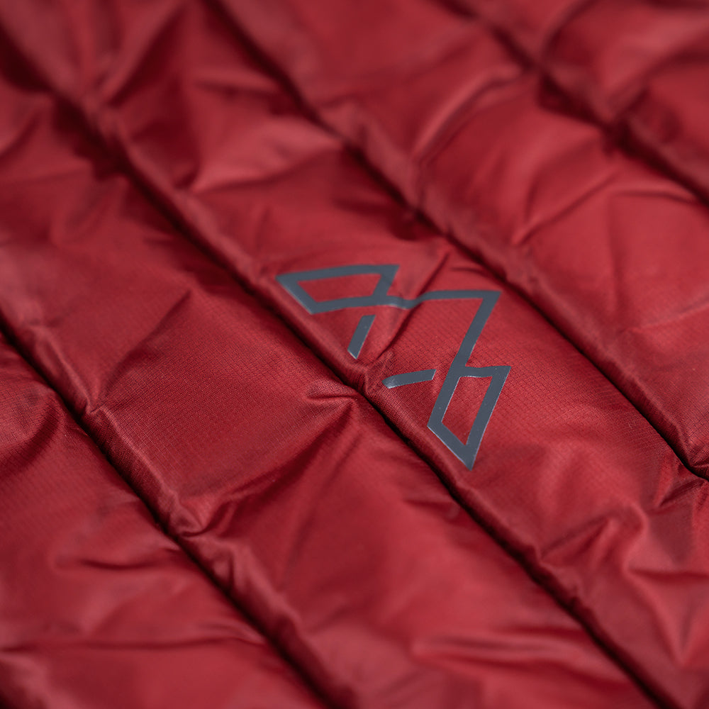 Fjern - Mens Aktiv Down Gilet (Rust/Charcoal) | Gear up your alpine performance with the Aktiv Gilet, a versatile and lightweight insulated layer that offers core warmth without the bulk