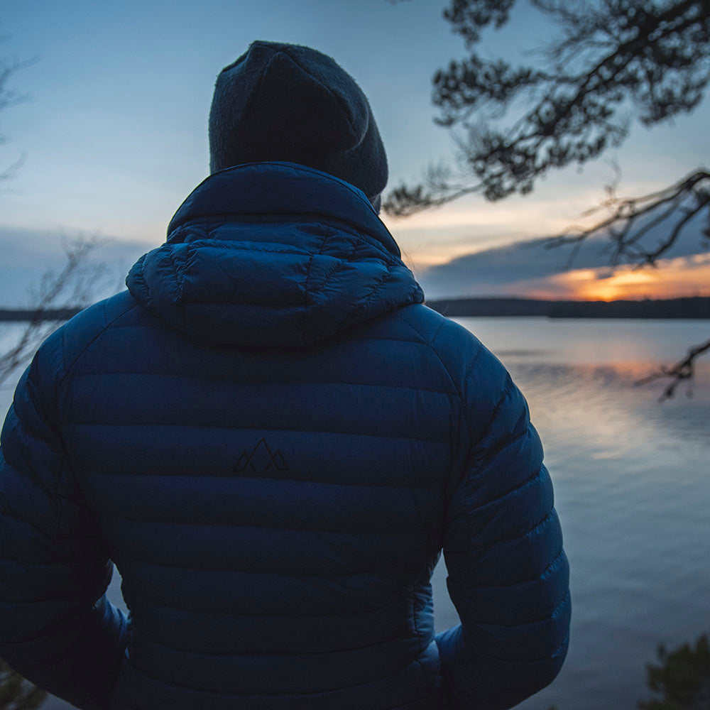Fjern - Mens Aktiv Down Hooded Jacket (Cobalt/Navy) | Venture further with the Aktiv, a versatile and lightweight insulated layer that offers exceptional warmth in a compact package
