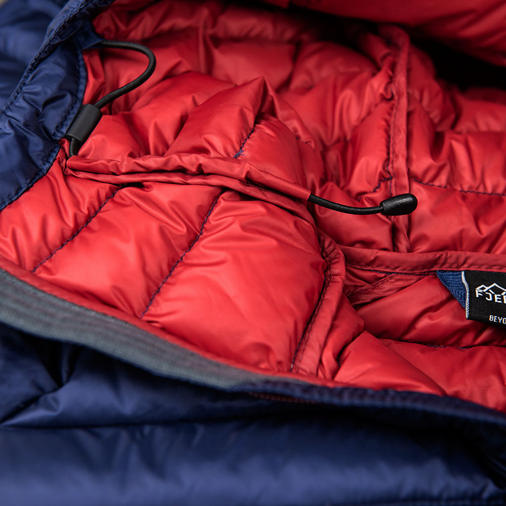Fjern - Mens Aktiv Down Hooded Jacket (Navy/Rust) | Venture further with the Aktiv, a versatile and lightweight insulated layer that offers exceptional warmth in a compact package