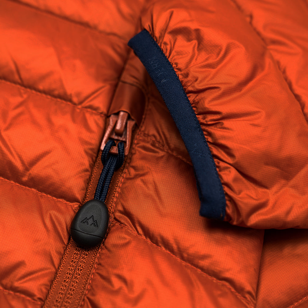 Fjern - Mens Aktiv Down Hooded Jacket (Burnt Orange/Navy) | Venture further with the Aktiv, a versatile and lightweight insulated layer that offers exceptional warmth in a compact package