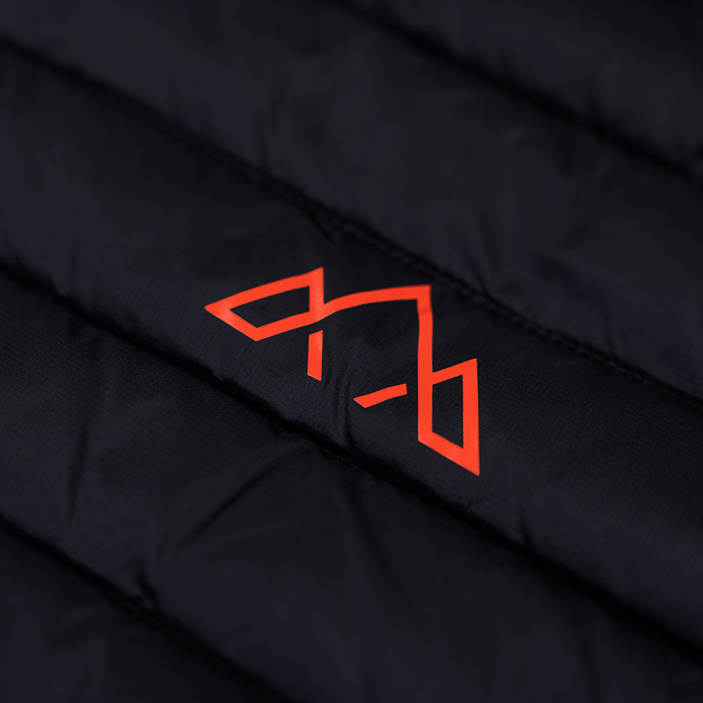 Fjern - Mens Aktiv Down Hoodless Jacket (Black/Orange) | Venture further with the Aktiv, a versatile and lightweight insulated layer that offers exceptional warmth in a compact package