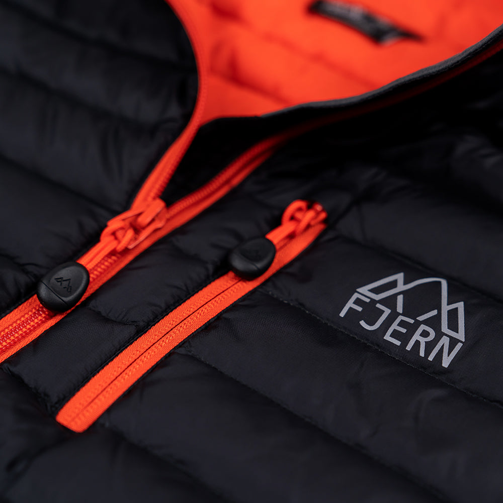 Fjern - Mens Aktiv Down Hoodless Jacket (Black/Orange) | Venture further with the Aktiv, a versatile and lightweight insulated layer that offers exceptional warmth in a compact package