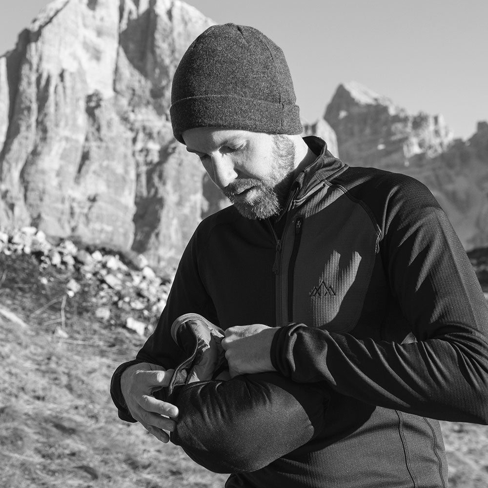 Fjern - Mens Arktis Down Gilet (Black/Charcoal) | Designed to provide core warmth without the weight, this gilet features a clean, sleeveless design for unrestrictive movement during active pursuits
