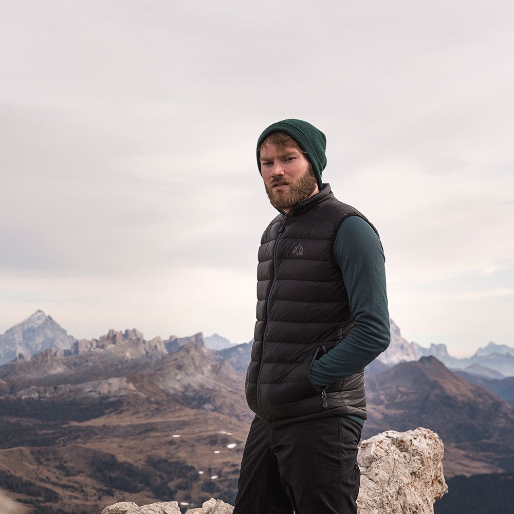 Charcoal) | Designed to provide core warmth without the weight, this gilet features a clean, sleeveless design for unrestrictive movement during active pursuits