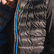 Fjern - Mens Arktis Down Gilet (Black/Cobalt) | Designed to provide core warmth without the weight, this gilet features a clean, sleeveless design for unrestrictive movement during active pursuits