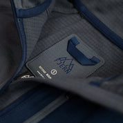 Fjern - Mens Bresprekk Half Zip Grid Fleece (Charcoal/Navy) | Designed to meet the demands of ever-changing alpine conditions, the Bresprekk functions as both a winter baselayer and a lightweight midlayer