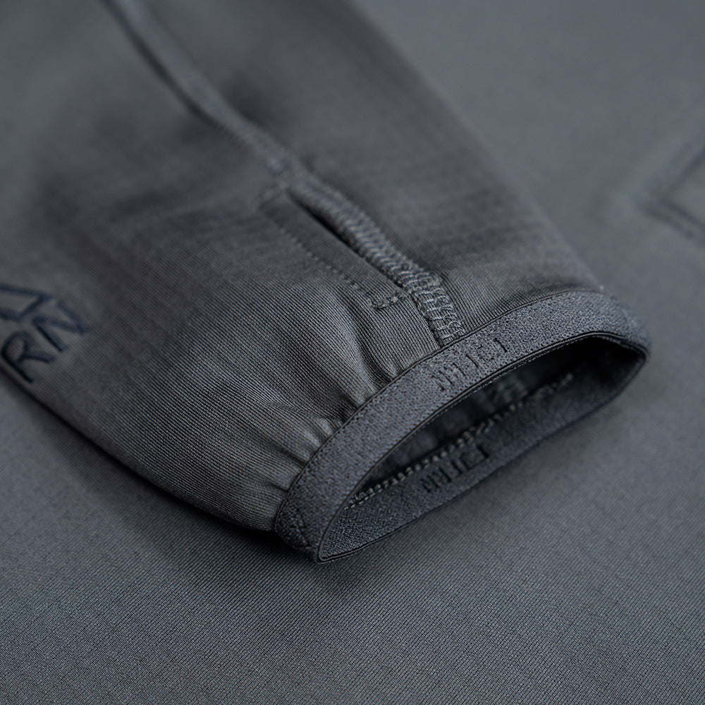 Fjern - Mens Bresprekk Half Zip Grid Fleece (Charcoal/Navy) | Designed to meet the demands of ever-changing alpine conditions, the Bresprekk functions as both a winter baselayer and a lightweight midlayer