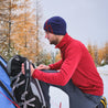 Fjern - Mens Bresprekk Half Zip Grid Fleece (Raspberry Red/Rust) | Designed to meet the demands of ever-changing alpine conditions, the Bresprekk functions as both a winter baselayer and a lightweight midlayer