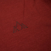 Fjern - Mens Första Merino Blend Long Sleeve Hoodie Baselayer (Rust) | Embark on your next adventure with the Första Hoodie, a lightweight and high-performance technical hoodie
