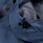 Fjern - Mens Forsvar Eco Waterproof Jacket (Indigo) | A testament to sustainable exploration, the Forsvar integrates planet-conscious waterproofing with a 15k/15k ecoSHIELD® fabric, crafted entirely from recycled polyester