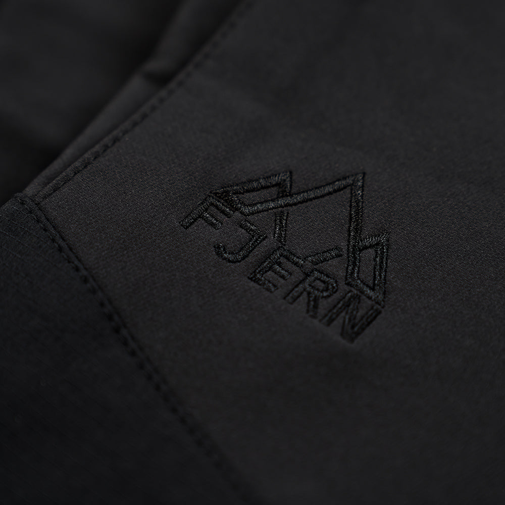 Fjern - Mens Hagna Eco Softshell Trousers (Black) | Explore the wild with trousers designed for the most challenging terrains