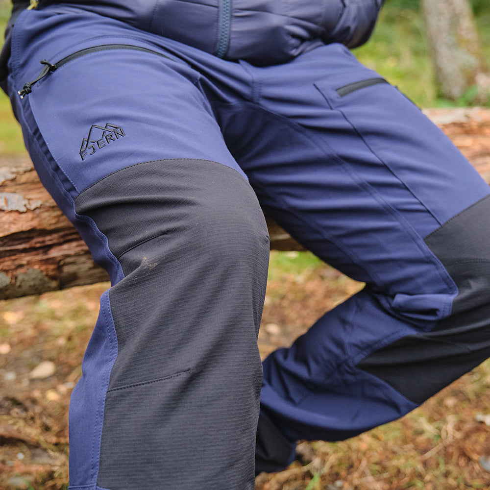 Fjern - Mens Hagna Eco Softshell Trousers (Navy/Black) | Explore the wild with trousers designed for the most challenging terrains