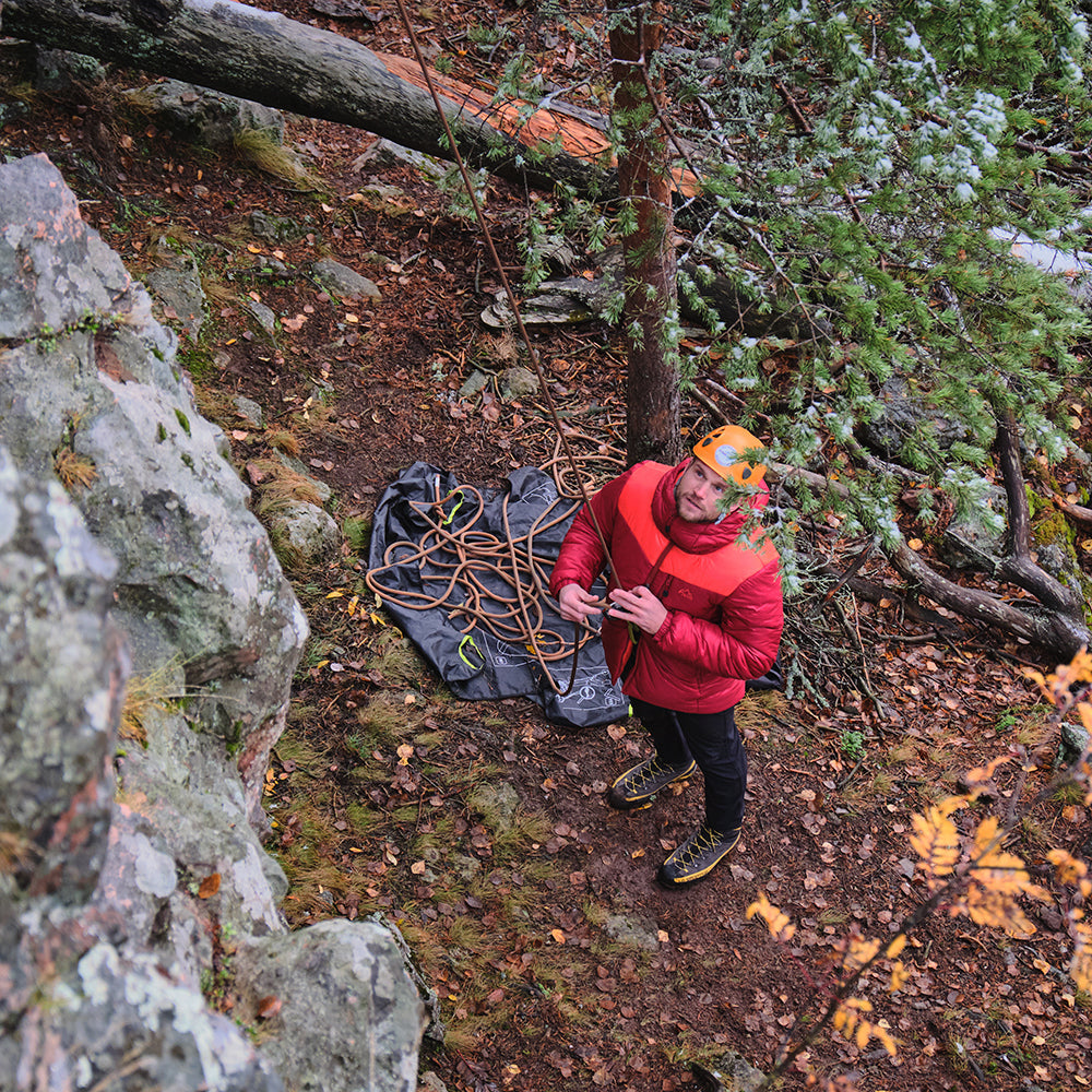 Orange) | Brave the extreme cold with our warmest insulated layer, perfect for climbing and outdoor adventures in frigid conditions