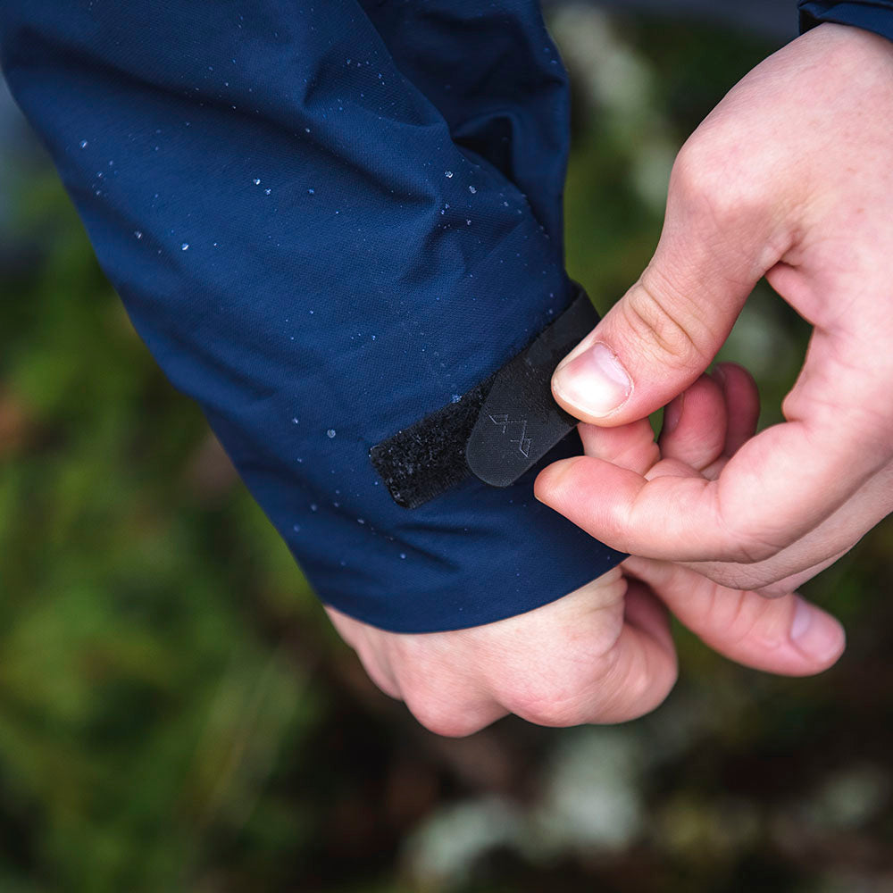 Fjern - Mens Orkan Waterproof Shell Jacket (Navy/Rust) | Face the harshest alpine challenges with confidence in the Orkan jacket, engineered to excel in extreme conditions