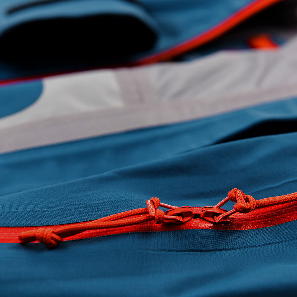 Fjern - Mens Orkan Waterproof Shell Jacket (Teal/Orange) | Face the harshest alpine challenges with confidence in the Orkan jacket, engineered to excel in extreme conditions