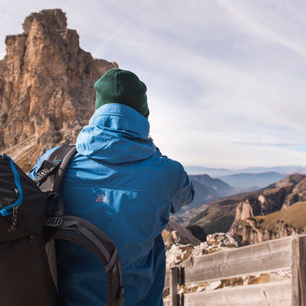 Orange) | Face the harshest alpine challenges with confidence in the Orkan jacket, engineered to excel in extreme conditions