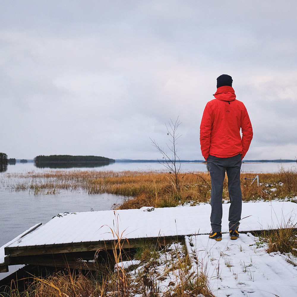 Fjern - Mens Orkan Waterproof Shell Jacket (Orange/Navy) | Face the harshest alpine challenges with confidence in the Orkan jacket, engineered to excel in extreme conditions