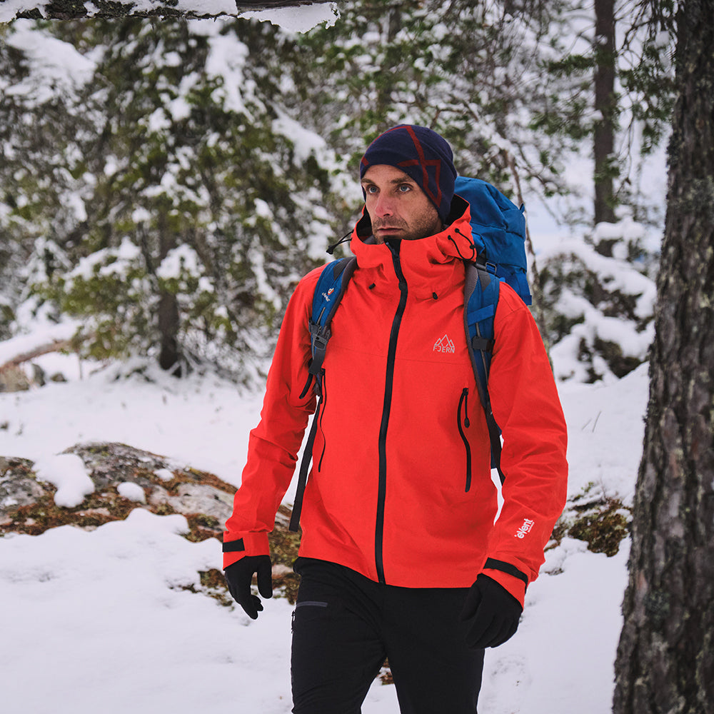Navy) | Face the harshest alpine challenges with confidence in the Orkan jacket, engineered to excel in extreme conditions
