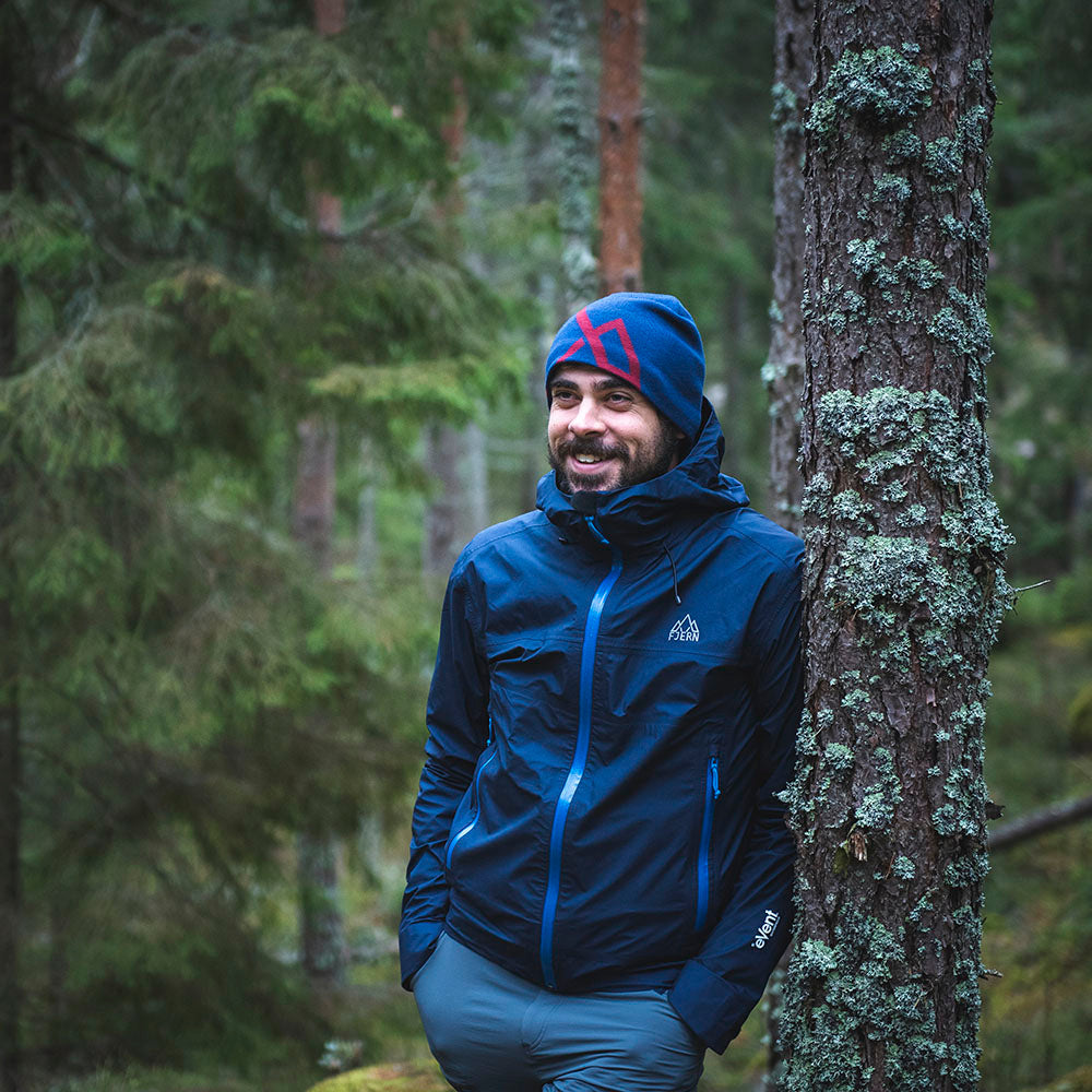 Fjern - Mens Skjold Packable Waterproof Jacket (Navy/Cobalt) | The Skjold is your ultimate shield for fast and light activities, designed to keep you active in any weather