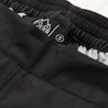 Fjern - Mens Vanntett Waterproof Trousers (Black) | Brave the elements with our mountaineering over-trousers, crafted from lightweight, waterproof Nylon ripstop with a DWR finish