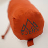 Fjern - Slumra Sleeping Bag Liner (Burnt Orange) | Made from 100% recycled polyester, this versatile liner boosts your sleeping bag's warmth in cool conditions and serves as a standalone bag for warm-weather camping or hostel stays