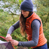 Fjern - Womens Aktiv Down Gilet (Burnt Orange/Navy) | Gear up your alpine performance with the Aktiv Gilet, a versatile and lightweight insulated layer that offers core warmth without the bulk