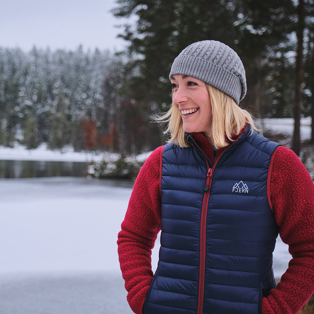 Rust) | Gear up your alpine performance with the Aktiv Gilet, a versatile and lightweight insulated layer that offers core warmth without the bulk