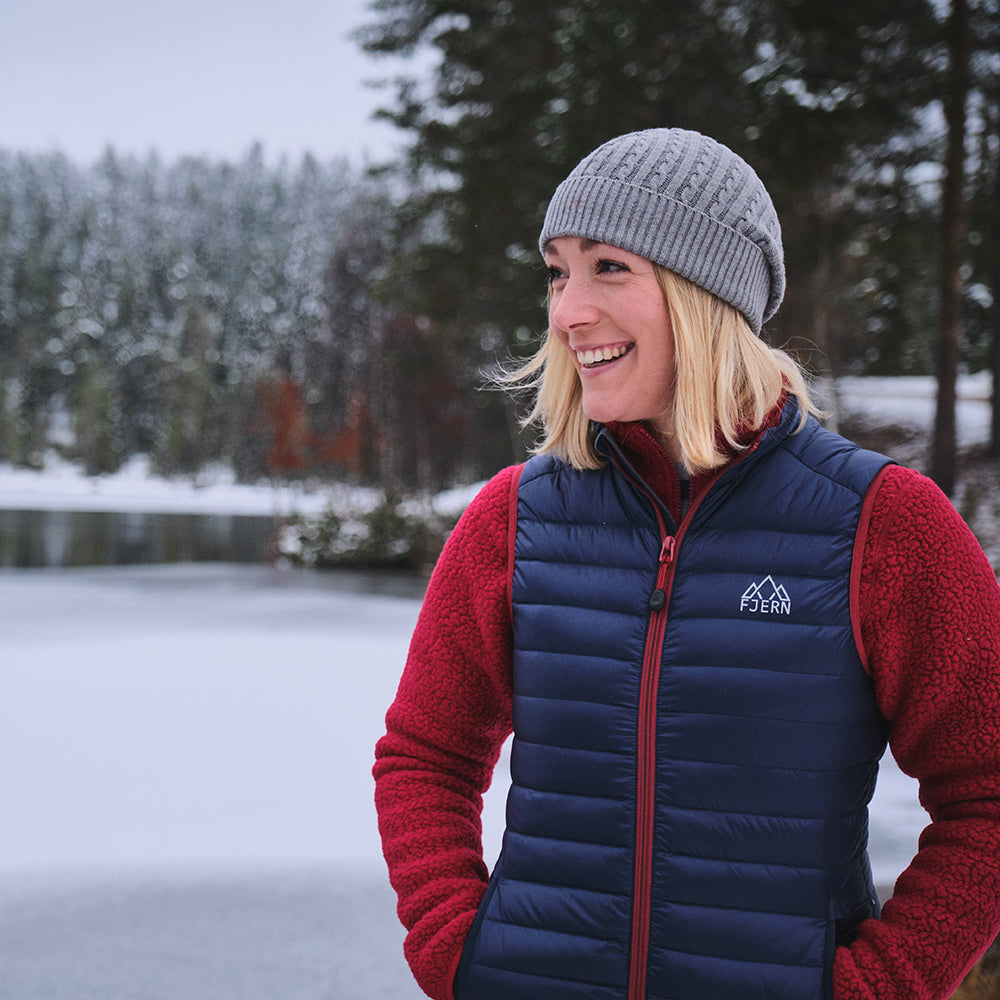 Fjern - Womens Aktiv Down Gilet (Navy/Rust) | Gear up your alpine performance with the Aktiv Gilet, a versatile and lightweight insulated layer that offers core warmth without the bulk