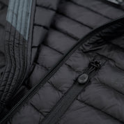 Fjern - Womens Aktiv Down Gilet (Stealth) | Gear up your alpine performance with the Aktiv Gilet, a versatile and lightweight insulated layer that offers core warmth without the bulk