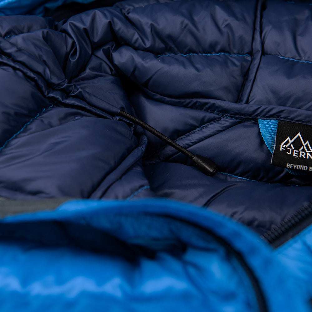 Fjern - Womens Aktiv Down Hooded Jacket (Cobalt/Navy) | Venture further with the Aktiv, a versatile and lightweight insulated layer that offers exceptional warmth in a compact package