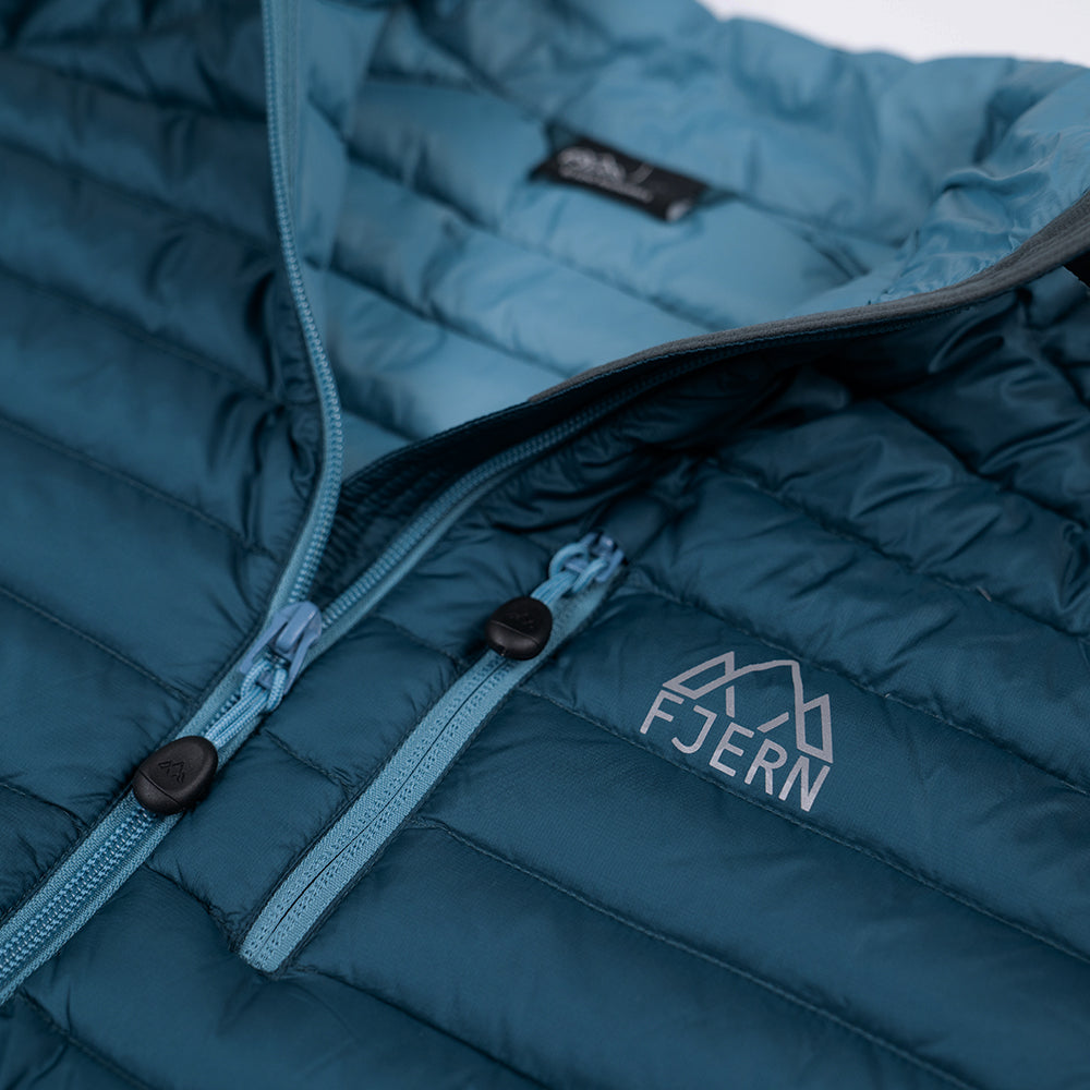 Fjern - Womens Aktiv Down Hoodless Jacket (Petrol/Arctic Blue) | Venture further with the Aktiv, a versatile and lightweight insulated layer that offers exceptional warmth in a compact package